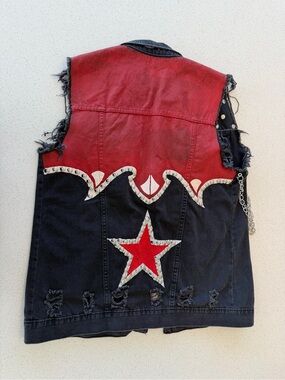One of a kind handmade studded denim vest. Rockstar festival burning man vest